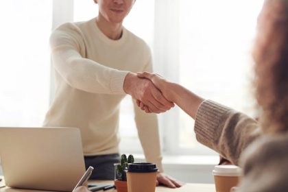 Business meeting about commercial auto insurance