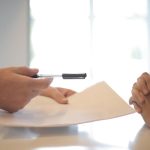Driver reviewing insurance coverage options
