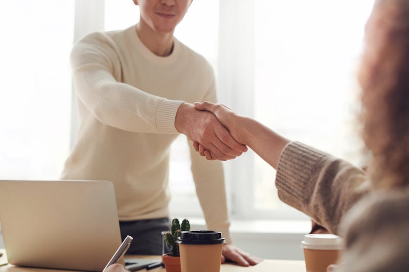 Business meeting about commercial auto insurance